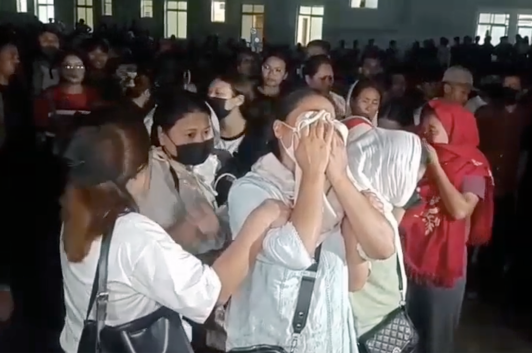 A video screenshot shows Naga mourners grieving the deaths of six men from Konsakhul village who were abducted and killed in Manipur, India.