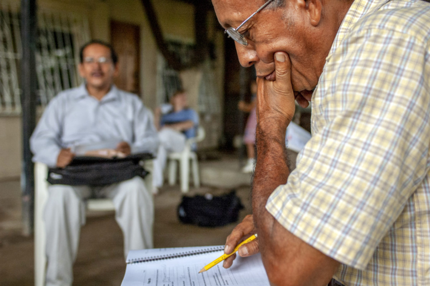 At a house church in Durán, Ecuador, house church leaders study a theological education curriculum — an example of the grassroots, non-formal training ICETE aims to represent at its C27 global consultation in Mombasa, Kenya, in 2027.