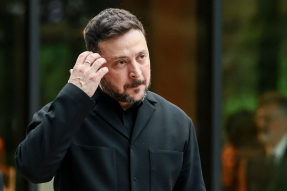 EVIAN-LES-BAINS, FRANCE - JUNE 16: Ukrainian President Volodymyr Zelensky prepares to pose for a family photo before a cultural performance and concert during the G7 Summit on June 16, 2026 in Evian-les-Bains, France.