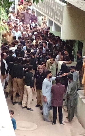 Muslim mob protests outside of home of Christian accused of blasphemy in Karachi, Pakistan on July 9, 2026.
