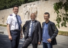 (From Left) Markus Hofer, Joseph Kabongo and Michael Mutzner in front of the Reformation Wall in Geneva.