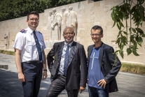 (From Left) Markus Hofer, Joseph Kabongo and Michael Mutzner in front of the Reformation Wall in Geneva.