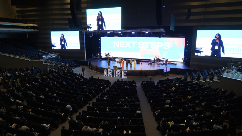 Jackie Ro, left, leads the Arise Asia Next Steps team on stage during the closing session of the Arise Asia 2026 Congress at Christs Commission Fellowship Central in Manila, Philippines, July 31, 2026.