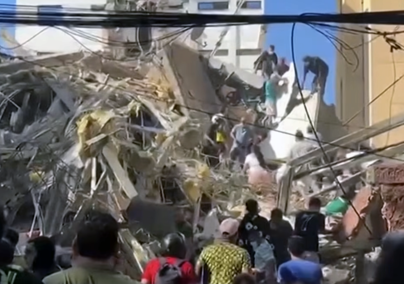 Residents and rescue workers search through the rubble of a collapsed building following a magnitude 7.4 earthquake that struck Colombia on Aug. 10, 2026.
