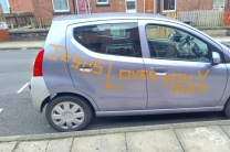 Stickers on Simeon Chandra’s car that insurance broker GoSkippy ordered removed in order to validate his car insurance.