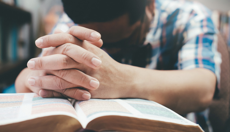African Man Praying