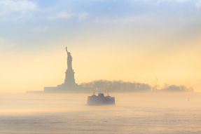 The Statue of Liberty stands in New York Harbor, long a symbol of refuge for those fleeing persecution, its pedestal bearing Emma Lazarus’ sonnet welcoming immigrants through a “golden door.” Fiscal Year 2026 will likely close Sept. 30 with no persecuted