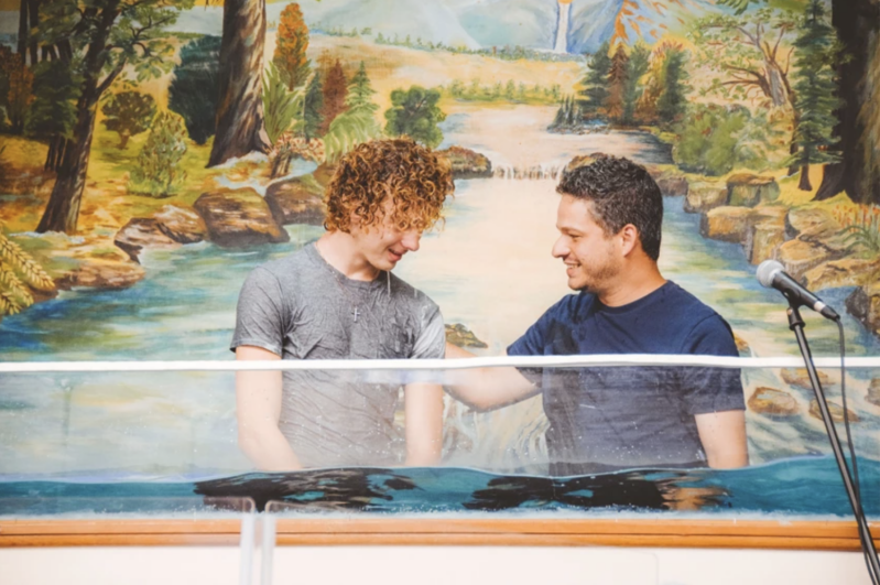 Albert Oliveira baptizes a new believer at First Baptist Church of Gordon, Texas, in July.