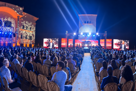 Attendees fill the courtyard of the Jordan Evangelical Theological Seminary during the Christ Our Hope evangelistic service in Amman, Jordan, on Friday, Sept. 4, 2026.