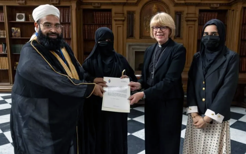 The Most Revd and Rt Hon Dame Sarah Mullally, Archbishop of Canterbury, presenting The Hubert Walter Award for Reconciliation and Interfaith Cooperation to controversial Pakistani Muslim cleric Hafiz Muhammad Tahir Mehmood Ashrafi.