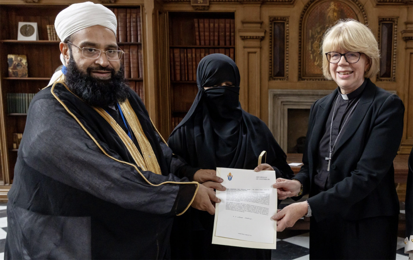 Archbishop of Canterbury Sarah Mullally presents the Hubert Walter Award for Reconciliation and Interfaith Cooperation to Pakistani cleric Tahir Mehmood Ashrafi, accompanied by his wife, at Lambeth Palace in London on Friday, Sept. 11, 2026.