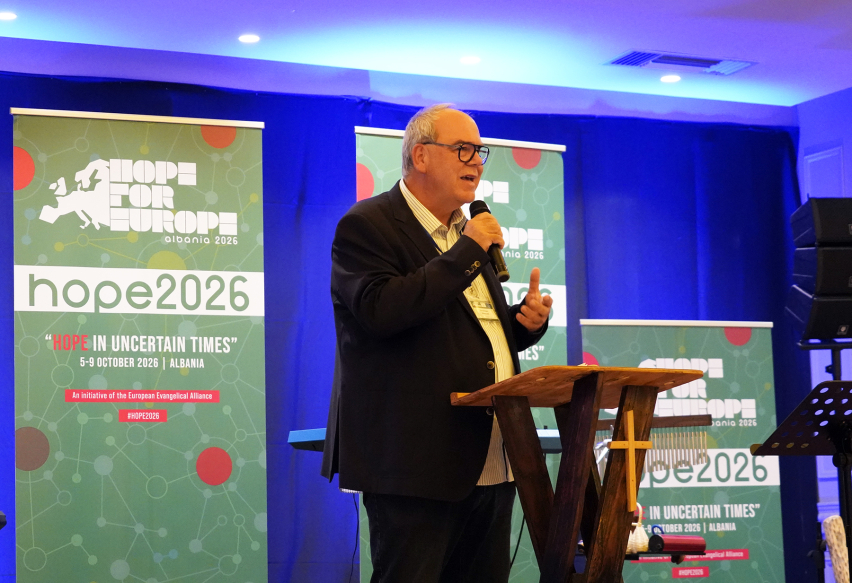 Andreas Wenzel, chair of the European Evangelical Alliance board, leads the Lords Supper at the opening of Hope for Europe 2026 in Golem, Albania, on Monday, Oct. 5, 2026.