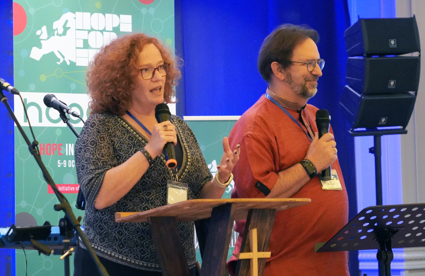Connie Main Duarte and Jan Wessels, co-general secretaries of the European Evangelical Alliance, introduce the theme Hope in Uncertain Times at the opening of Hope for Europe 2026 in Golem, Albania, on Monday, Oct. 5, 2026.