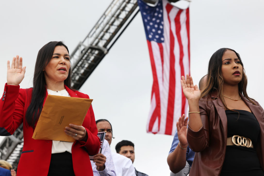 People participate in a Naturalization Ceremony at Liberty State Park on September 17, 2024 in Jersey City, New Jersey.