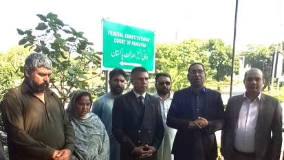 Christian rights activists and parents of Maria Shahbaz after Oct. 21, 2026 hearing at Federal Constitutional Court.