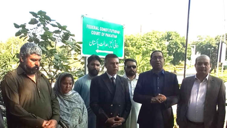 Christian rights activists and parents of Maria Shahbaz after Oct. 21, 2026 hearing at Federal Constitutional Court.
