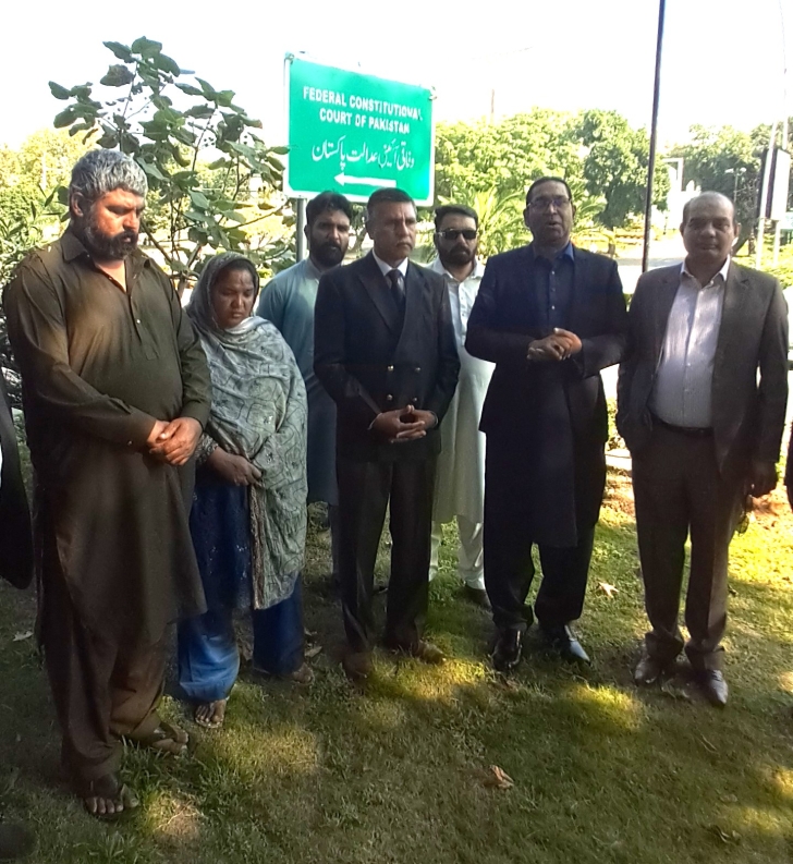 Christian rights activists and parents of Maria Shahbaz after Oct. 21, 2026 hearing at Federal Constitutional Court.