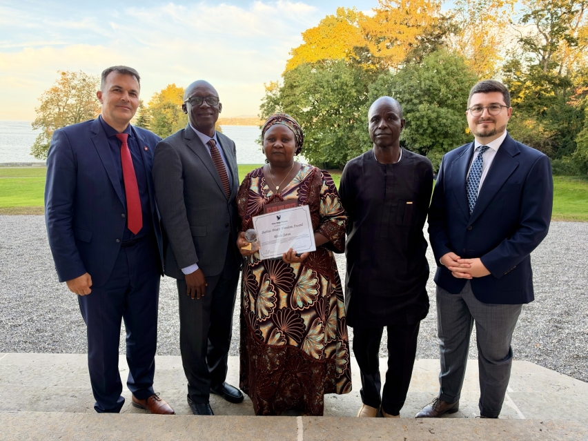 Rhoda Jatau, center, a Nigerian Christian mother acquitted in 2024 of blasphemy-related charges after 19 months in prison, holds the 2026 Shahbaz Bhatti Freedom Award in Geneva, Switzerland.