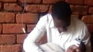 Christian beaten unconscious, home burned