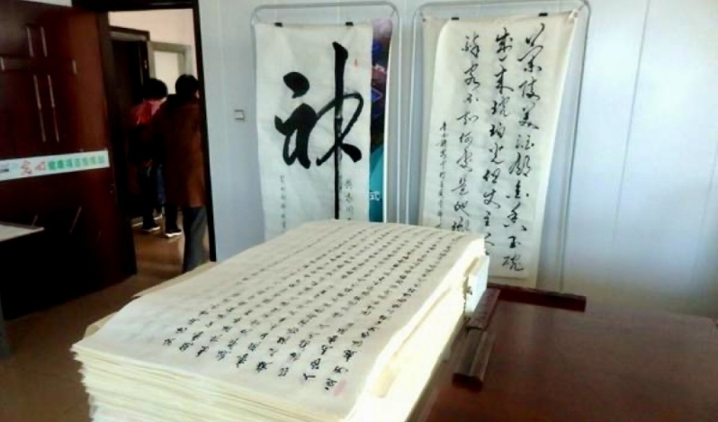 Believer completes three-year journey transcribing the Bible with Chinese brush pen
