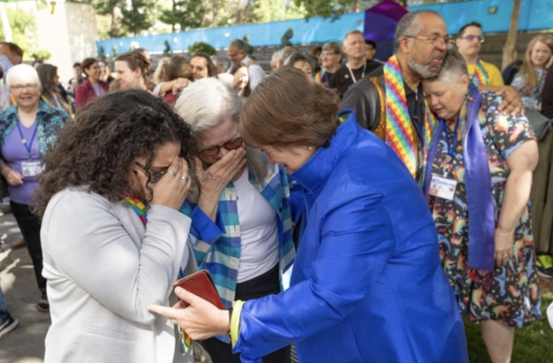 United Methodist Church drops decades-old ban on ordaining LGBT clergy without debate