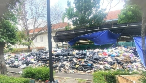 Authorities accused of allowing garbage to pile up near church in Indonesia