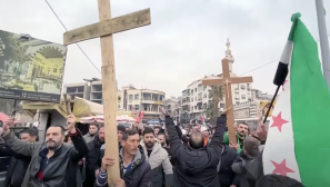 Protests erupted in Syria following the burning of a Christmas tree; Christians cautiously hopeful recognizing long road ahead