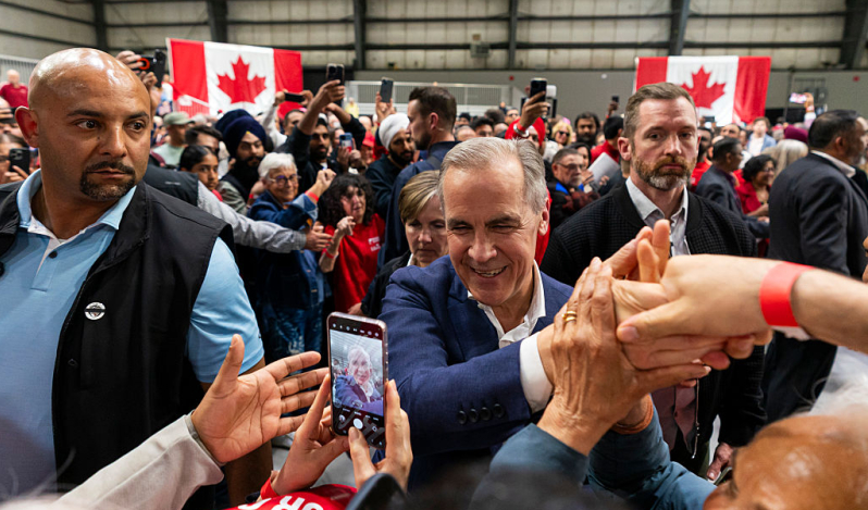Mark Carney emphasizes humility after Liberals win Canada's national election, takes strong stand against Trump
