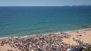 92 baptized in public mass ceremony on Bournemouth Beach, declaring faith in Jesus