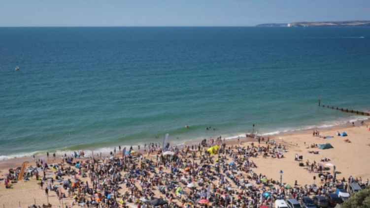92 baptized in public mass ceremony on Bournemouth Beach, declaring faith in Jesus