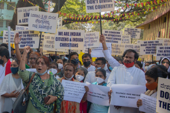 Advent celebrates God with the suffering, so we must be with them too