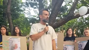 'Rally for Samuel' held in Brisbane after images allegedly show aborted boy dying while sucking his thumb
