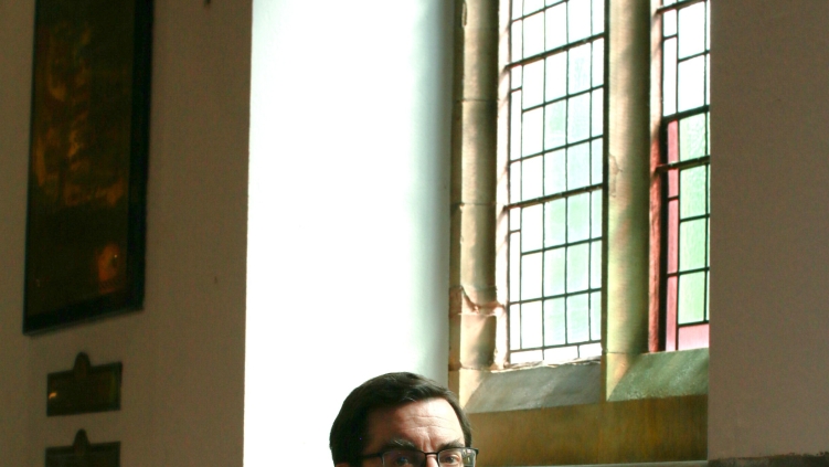 Priest wins settlement overturning blacklisting for comments on LGBT+ ideology