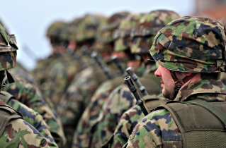 Swiss defence minister apologizes to churches for excluding them from clergy draft law change